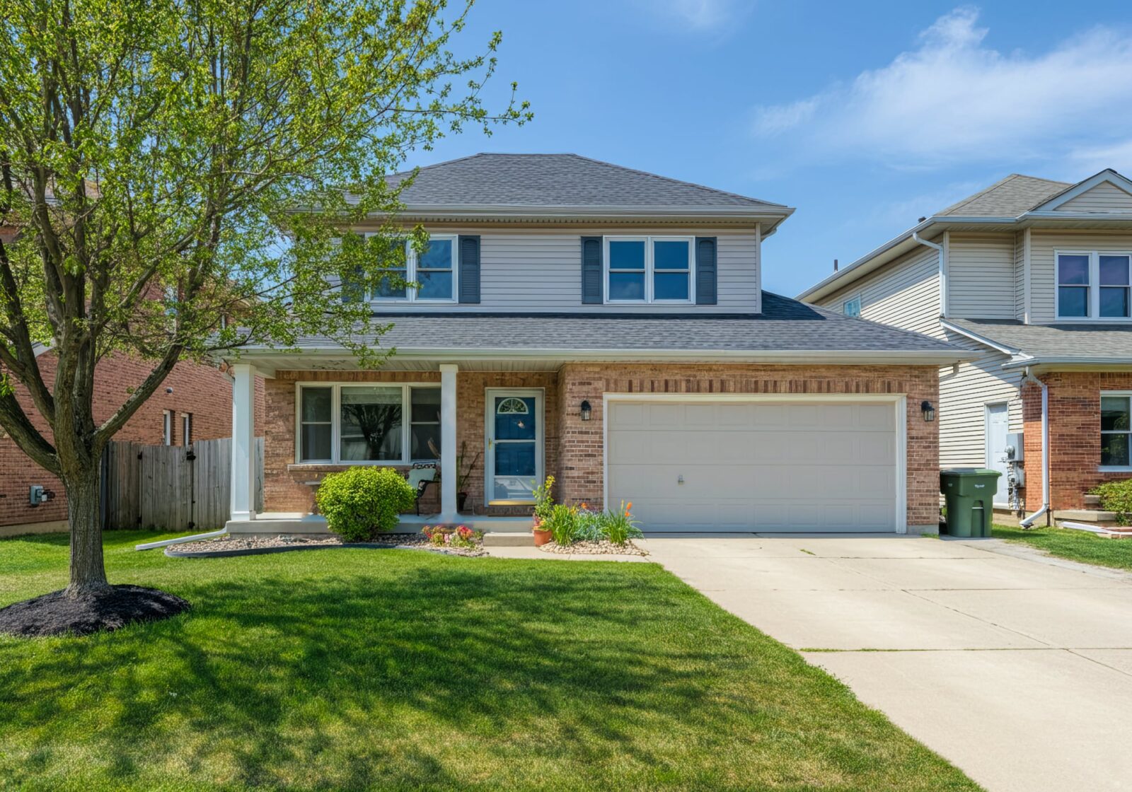 A 1990's two story home with an attached garage in Canton, Michigan