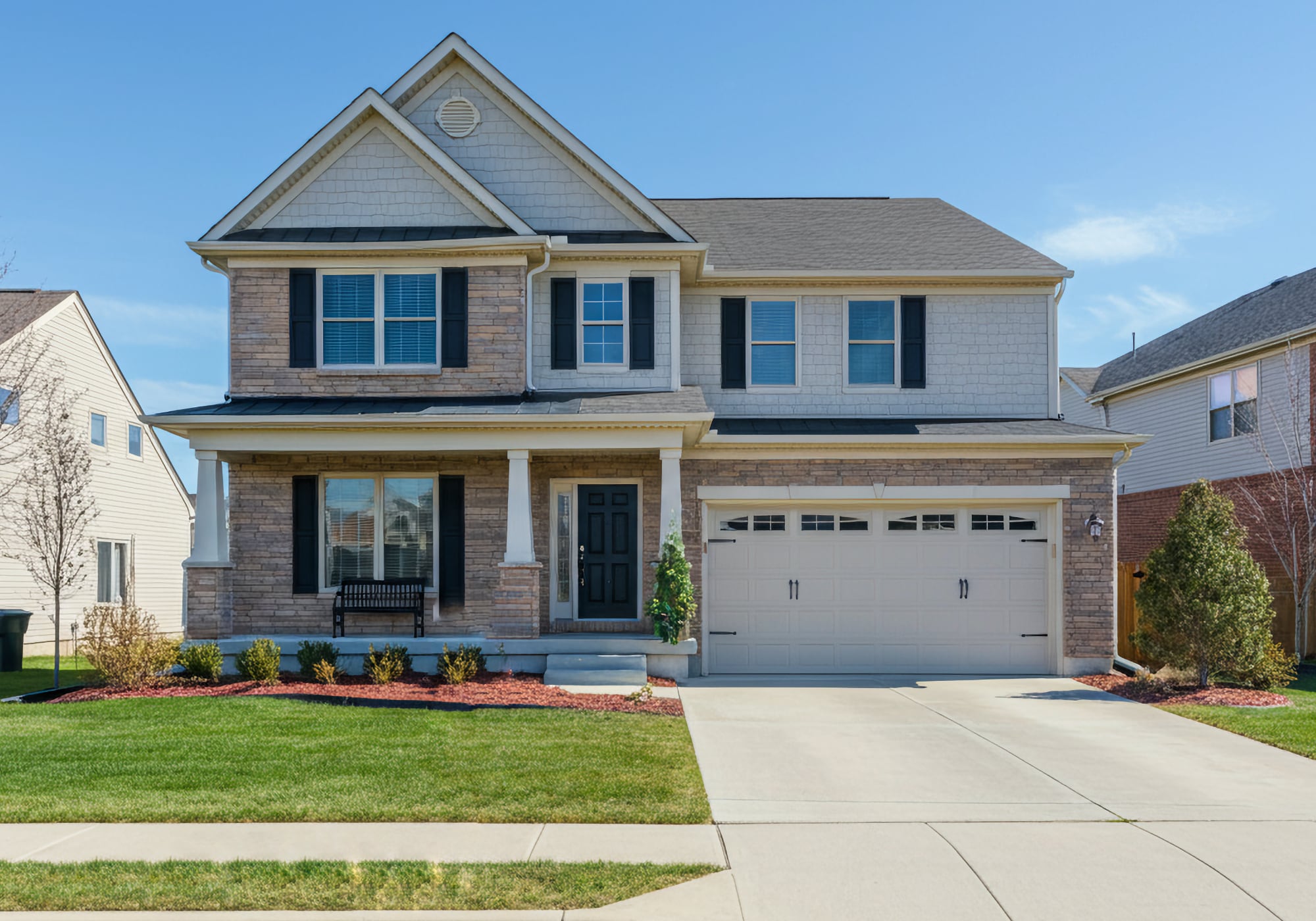 A 2010's two story modern craftsman home with two car attached garage in Novi Michigan